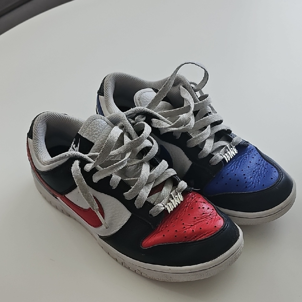Well Worn Nike Red, Blue, and White Dunk Sneakers